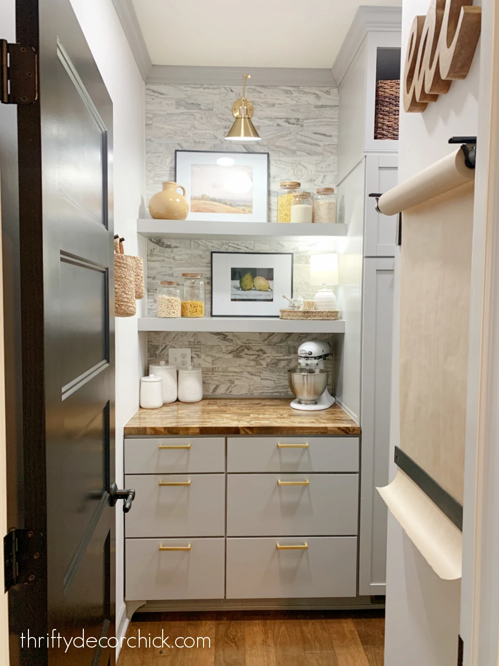 pantry with built in cabinets