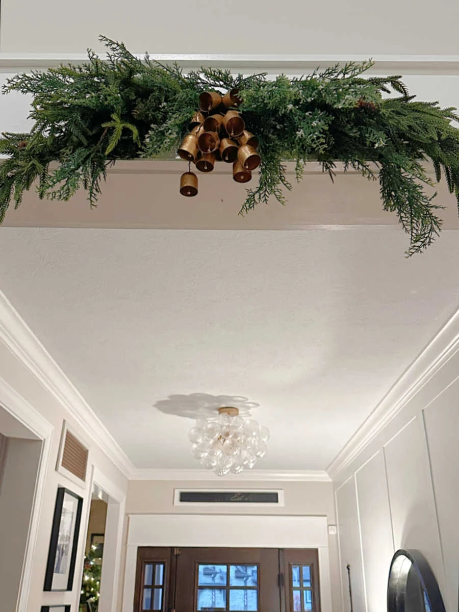 garland swag with bells over door