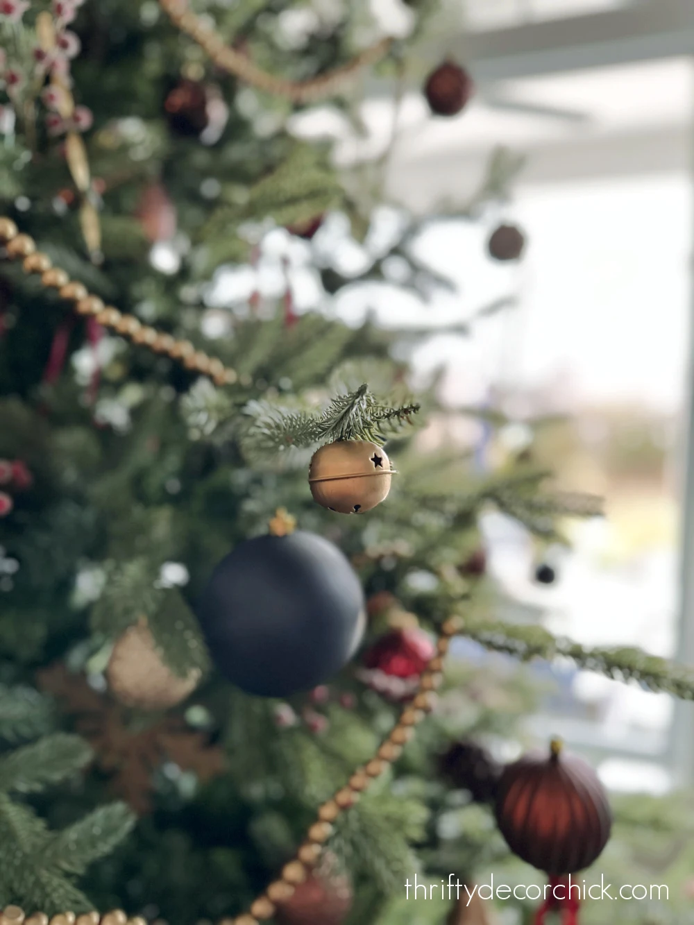 tiny bell ornaments on tree