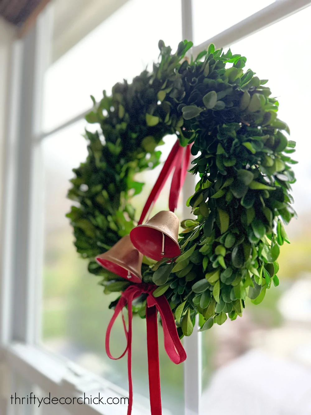 boxwood wreath with bells