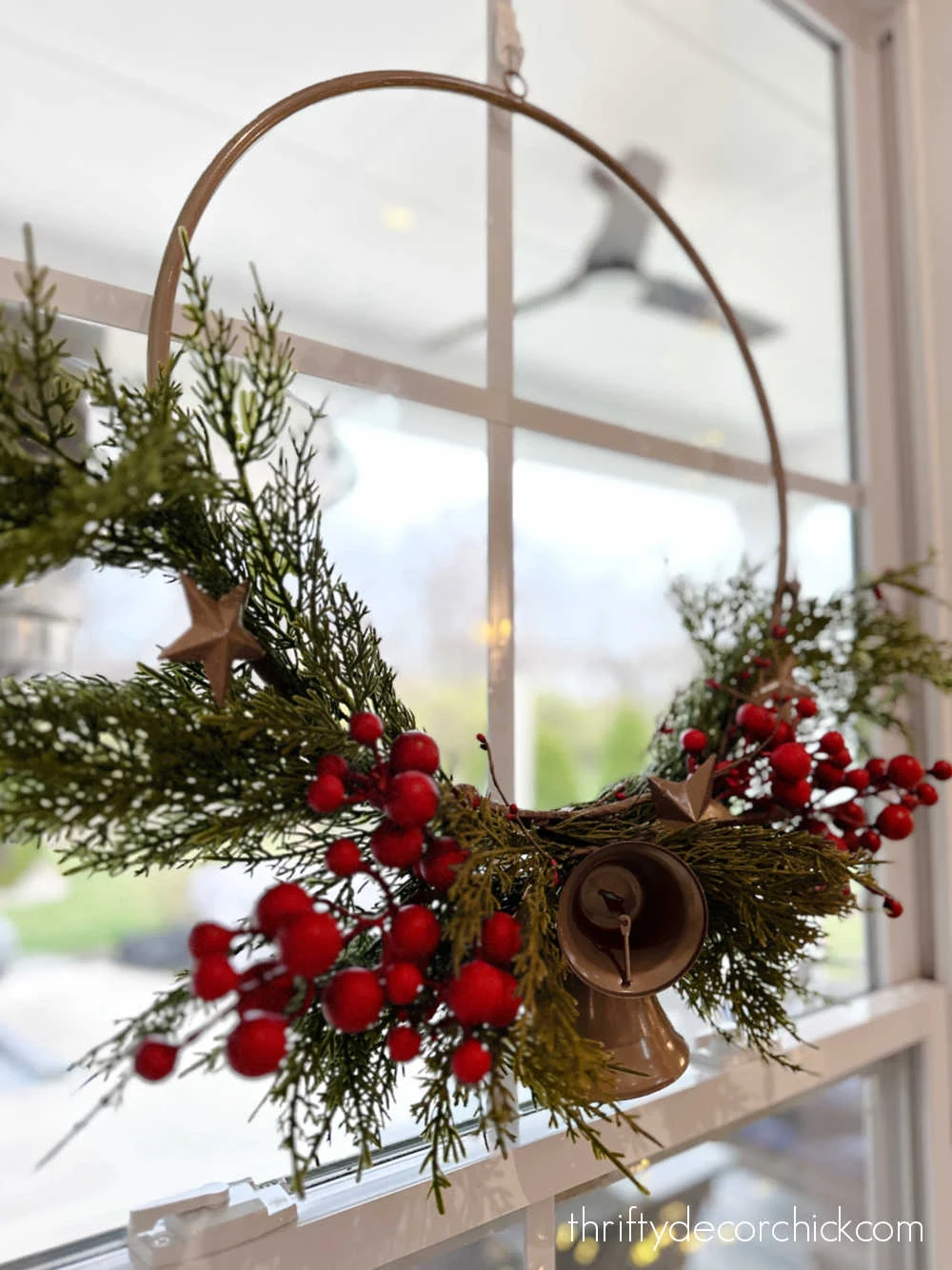 berries in wreath with greenery
