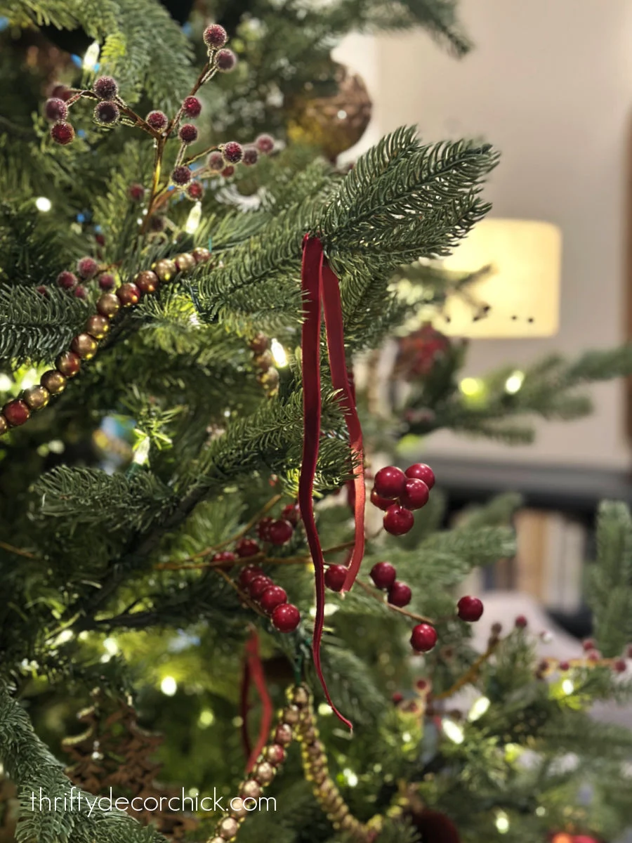 berry picks in Christmas tree