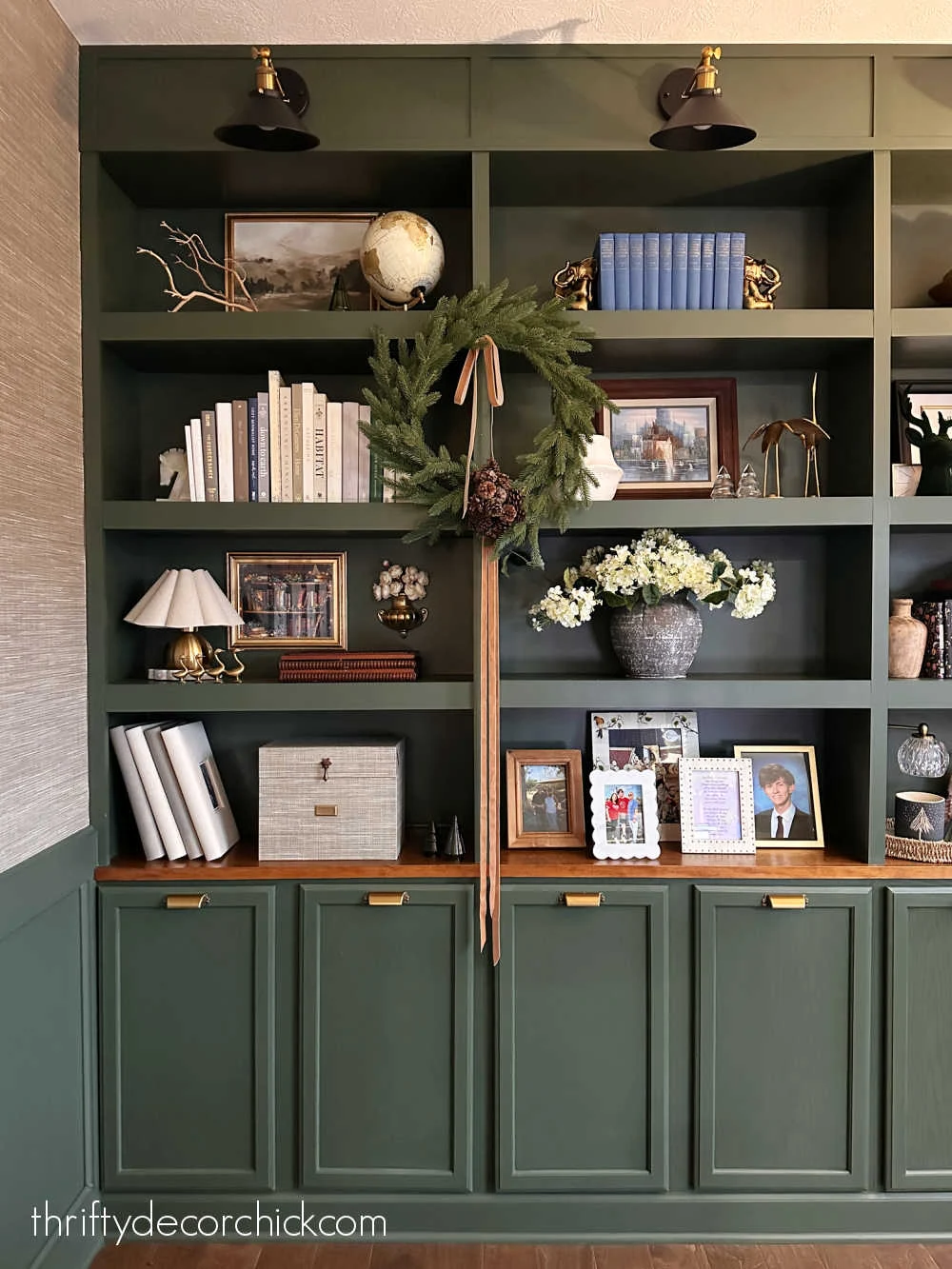 wreath hanging from bookcase