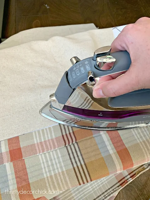 ironing a seam on pillow