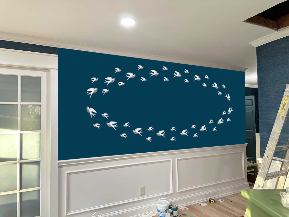 48 ceramic bird arrangement as art installation on bedroom wall