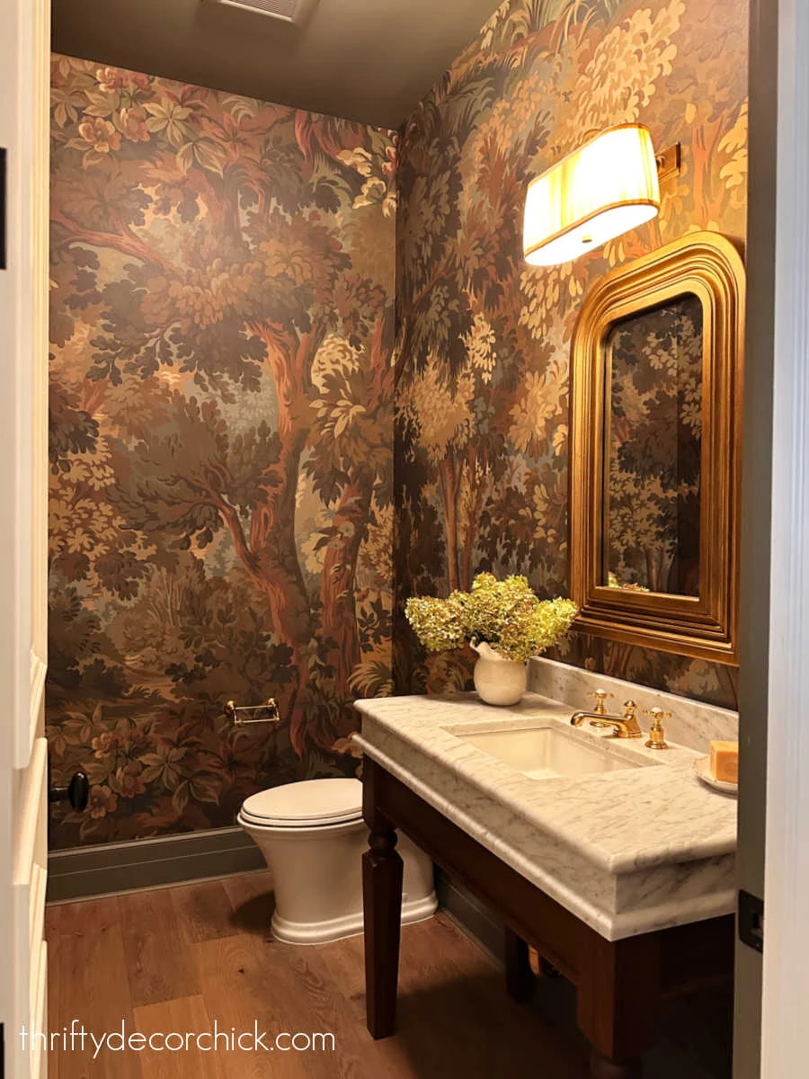 dark moody forest wallpaper powder room