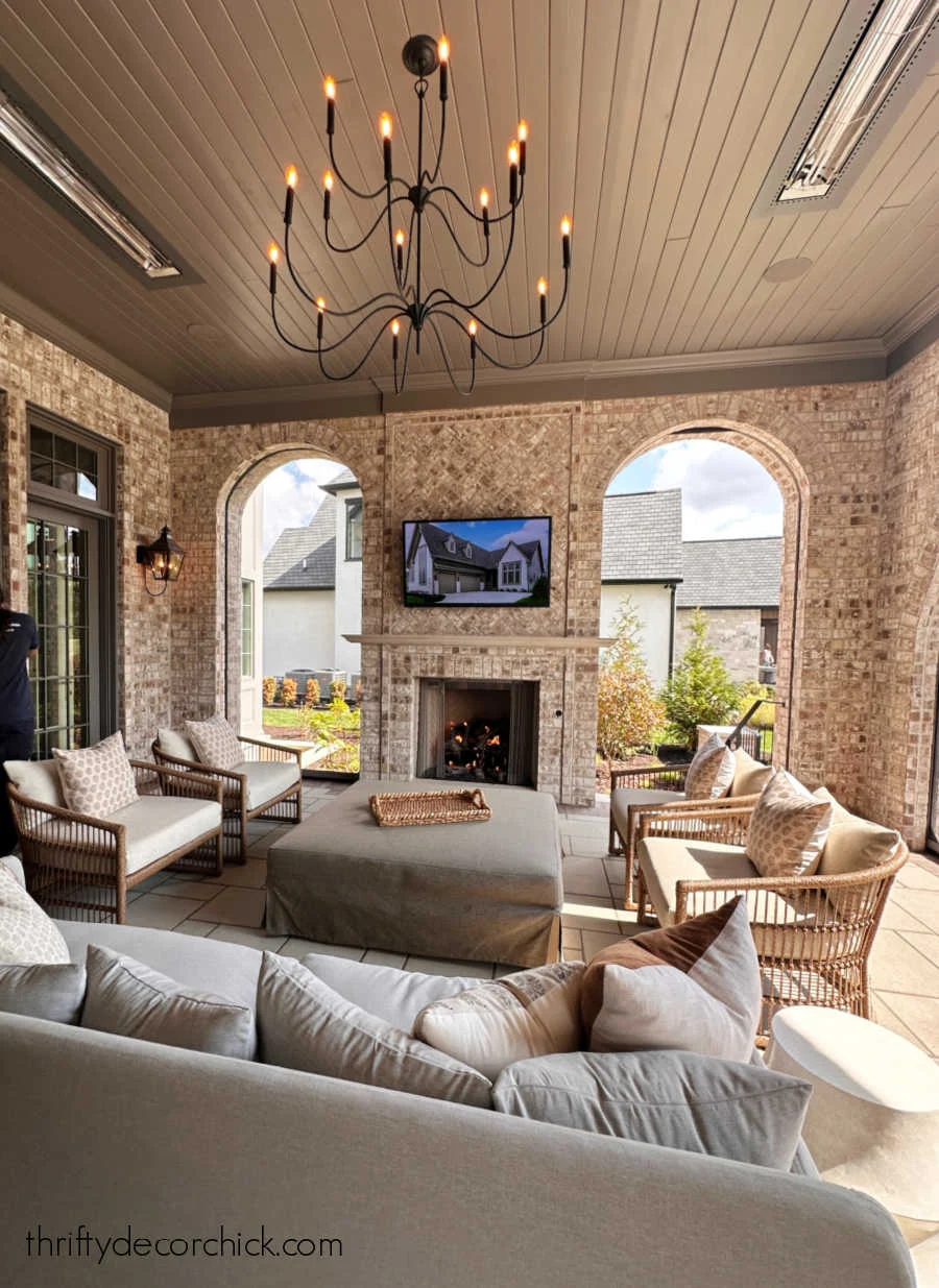 covered porch brick walls planked ceiling